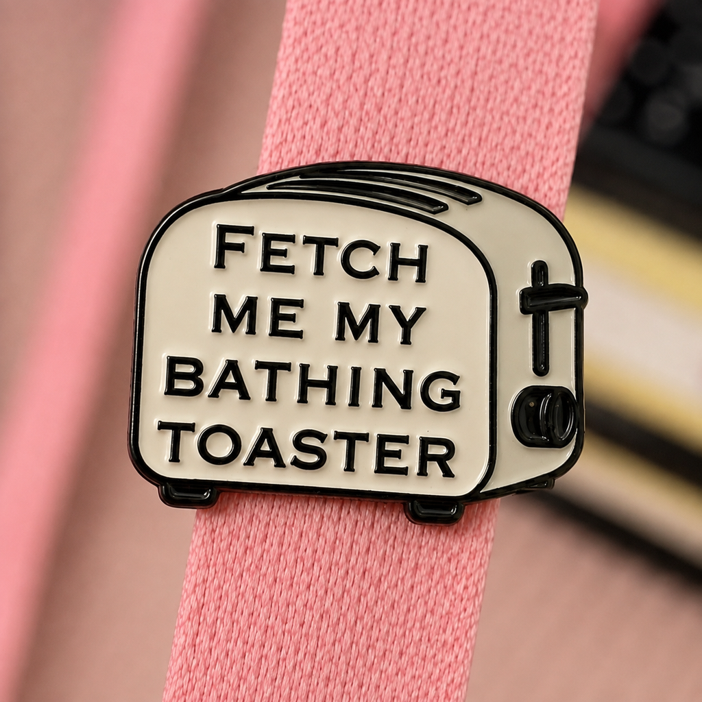 Fetch Me My Bathing Toaster enamel pin close up
