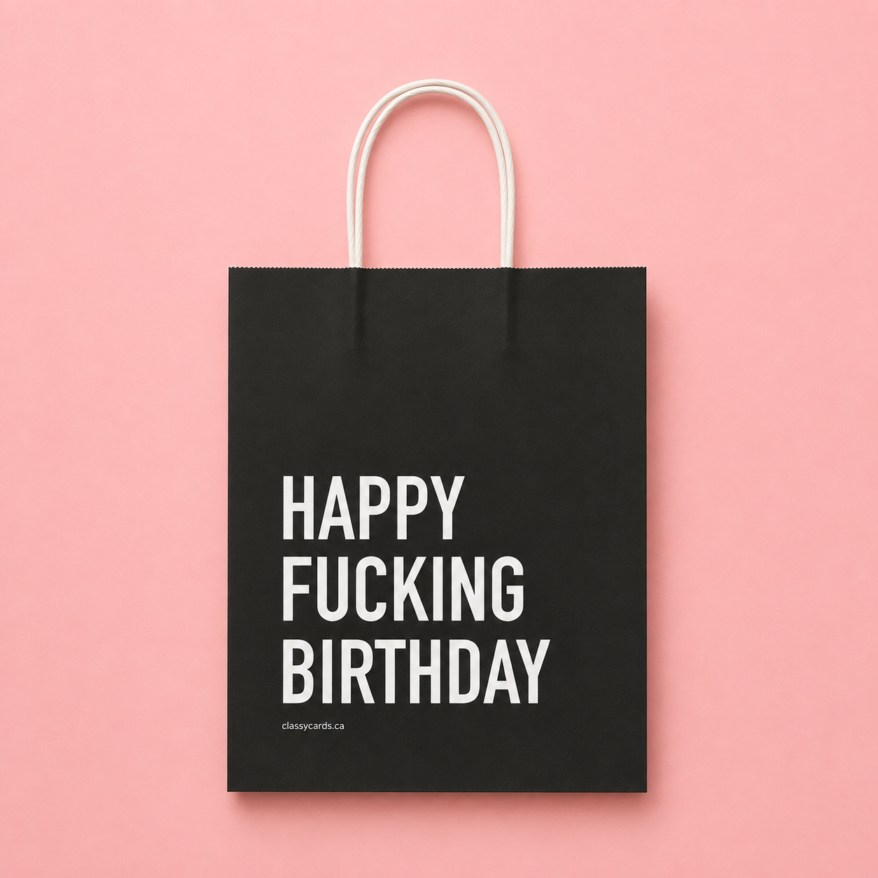 Black gift bag with the words HAPPY FUCKING BIRTHDAY