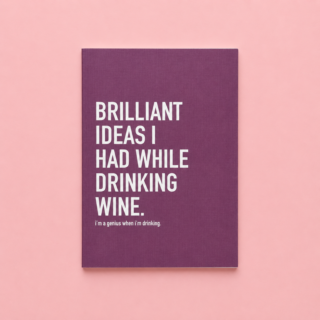 Plum notebook with the words BRILLIANT IDEAS I HAD WHILE DRINKING WINE