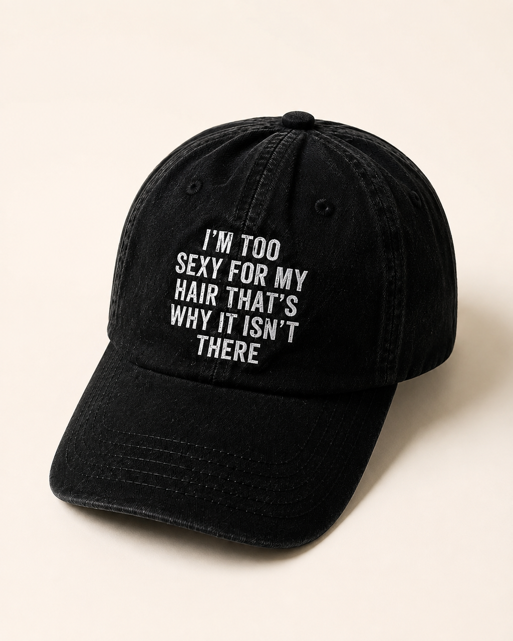 Black washed cap embroidered with I'm too sexy for my hair, that's why it isn't there