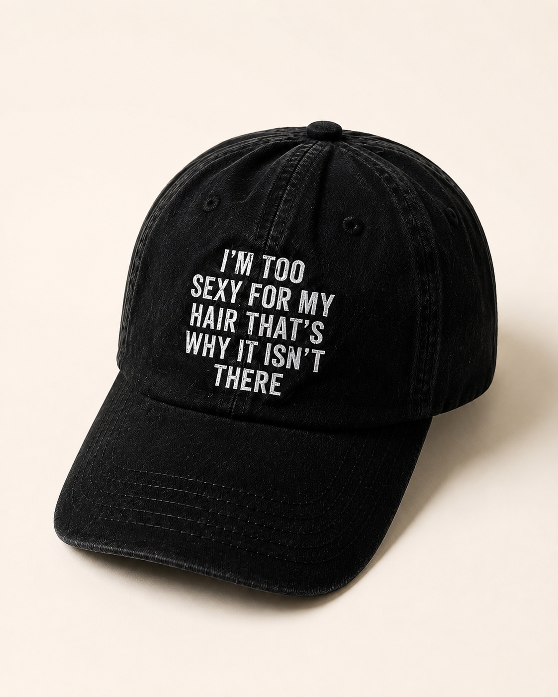 Black washed cap embroidered with I'm too sexy for my hair, that's why it isn't there