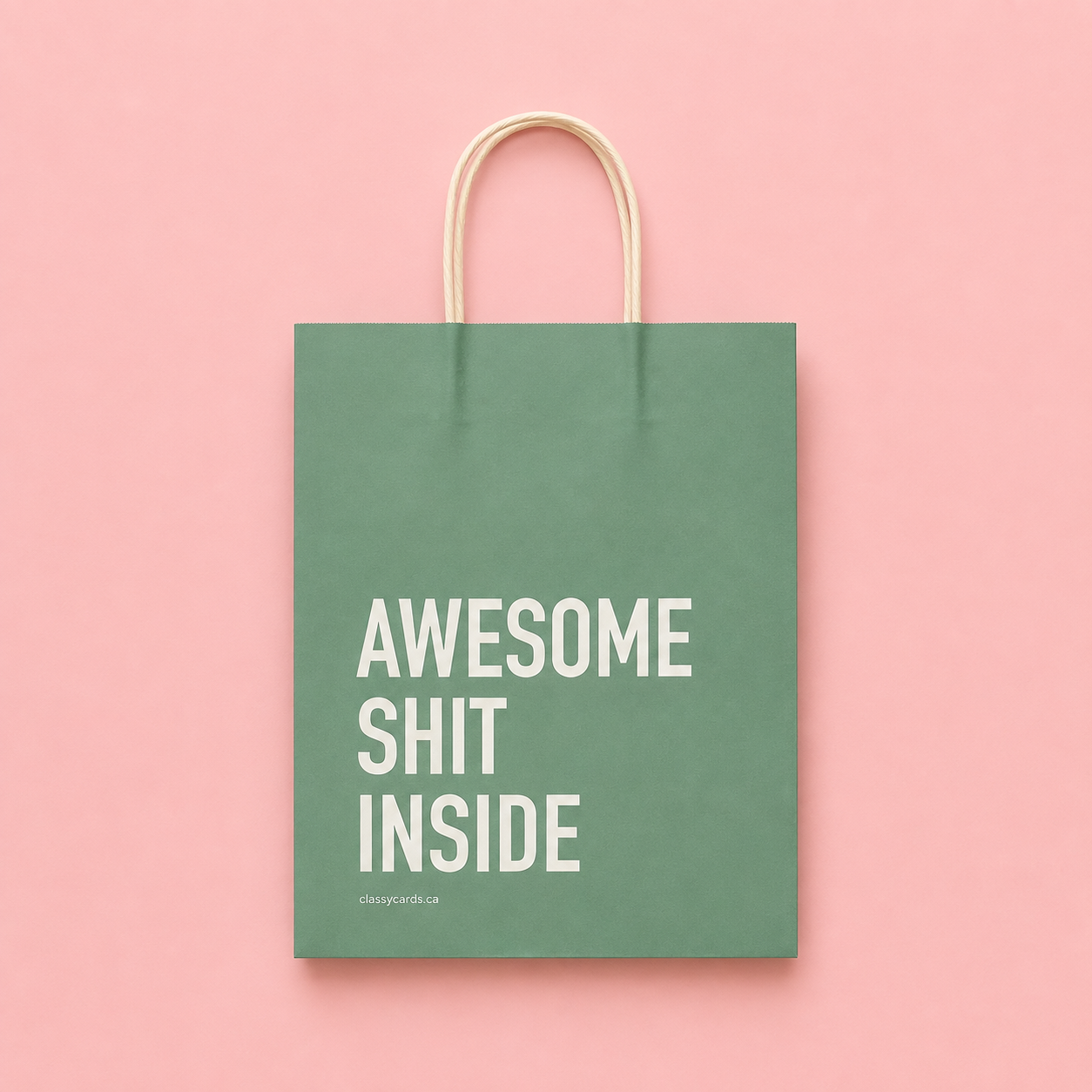 Sage green gift bag with the words AWESOME SHIT INSIDE
