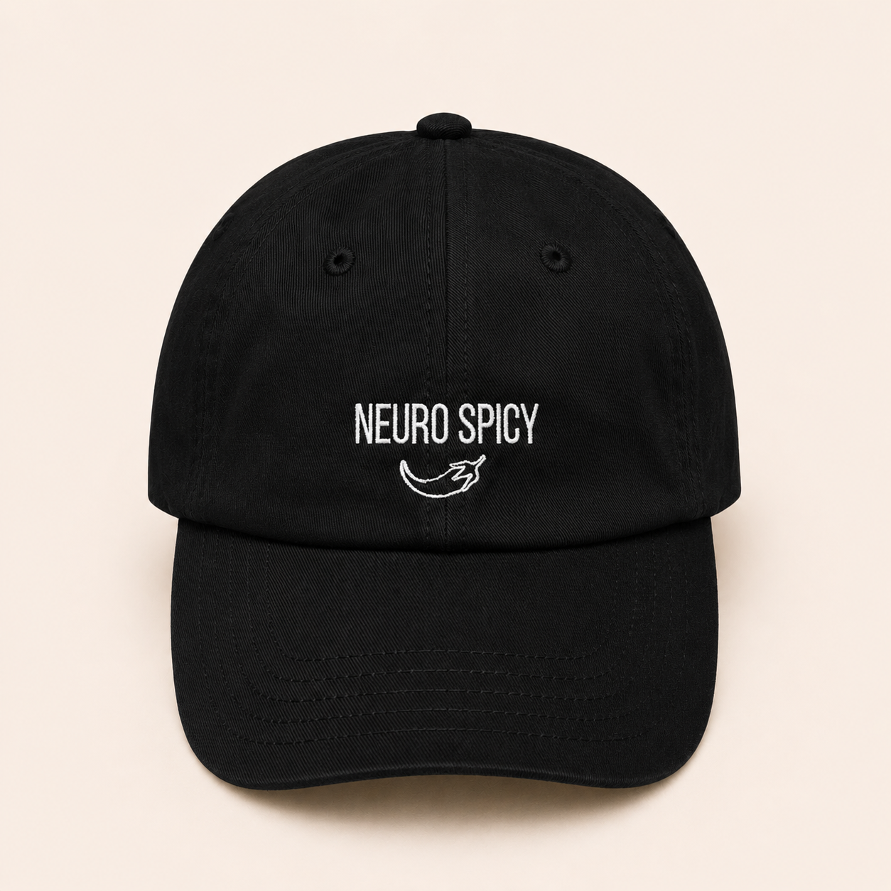 Black cap with 'NEURO SPICY' text and logo on a beige background