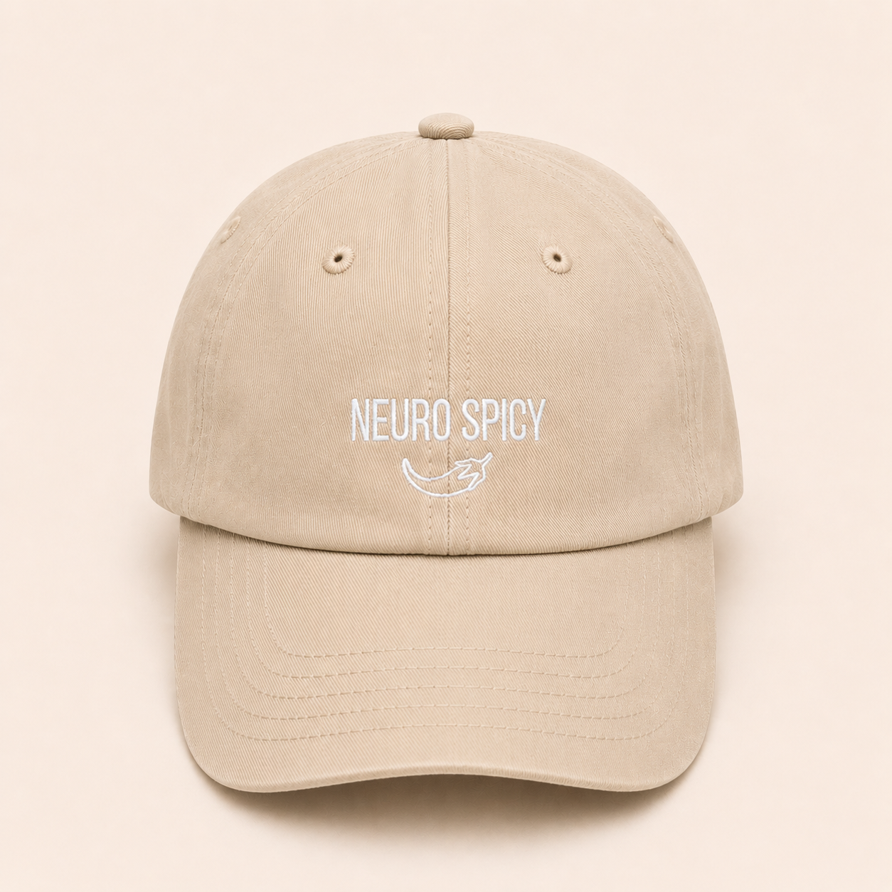 Beige cap with 'NEURO SPICY' text on a beige background